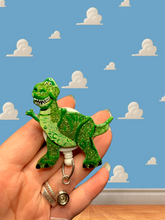 Load image into Gallery viewer, Glitter Dino Inspired Swivel Badge Reel