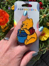 Load image into Gallery viewer, Glitter Pooh with Personalized Honey Pot Inspired “Pop&quot; Cell Phone Grip/ Stand