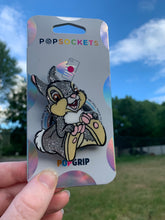 Load image into Gallery viewer, Glitter Thumper Inspired “Pop&quot; Cell Phone Grip/ Stand