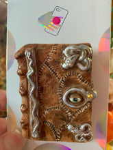 Load image into Gallery viewer, Hocus Pocus Book Inspired “Pop&quot; Cell Phone Grip/ Stand